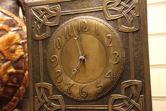 Margaret Gilmour (1860-1942). A Scottish Arts & Crafts brass wag at the wa wall clock, 14.75in.